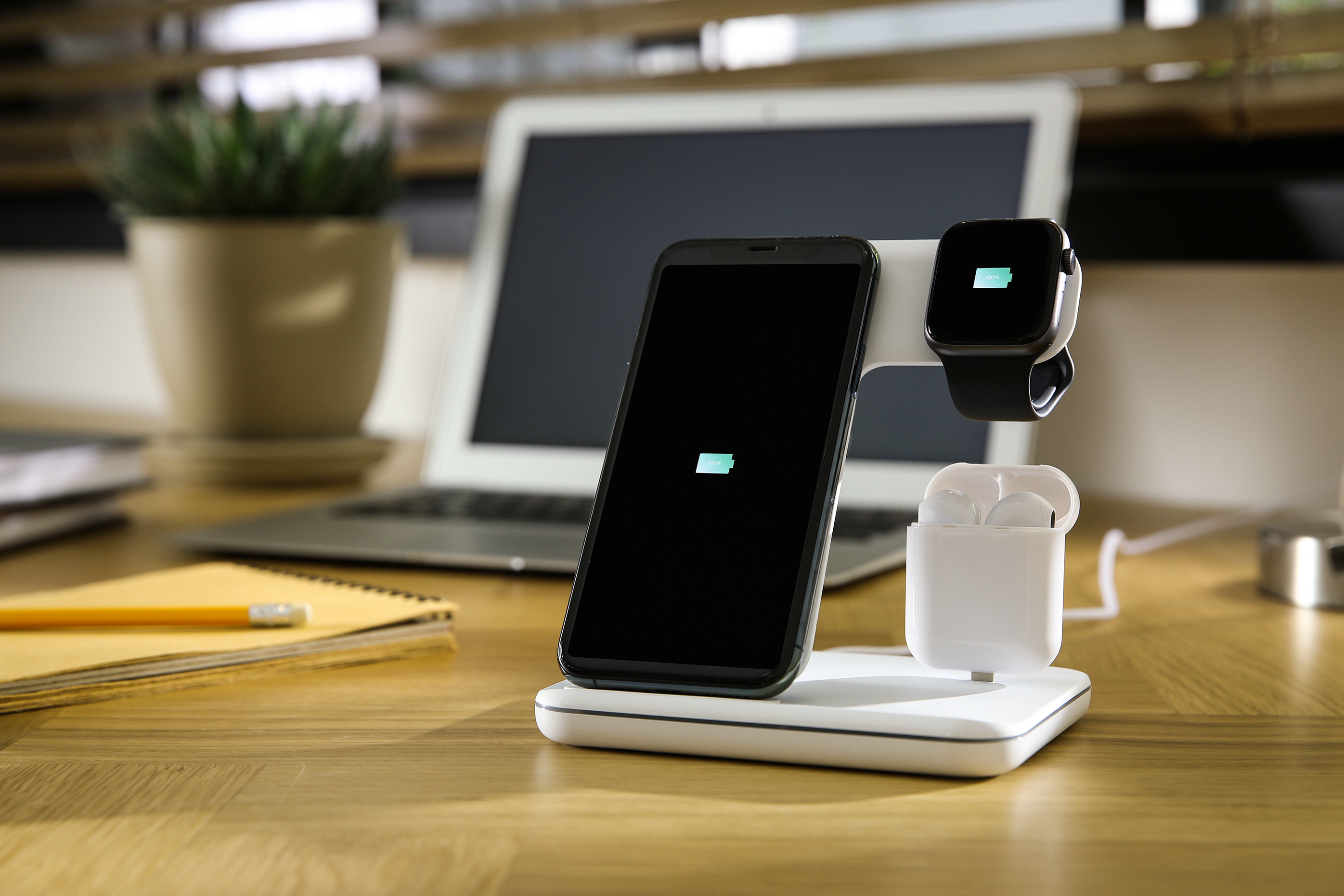 Wireless charging station for phone, earbuds and watch.